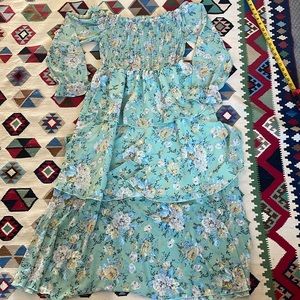 Off the shoulder, smocked, multi-tiered, long sleeved, long length floral dress